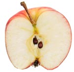 Half apple showing seeds inside. 