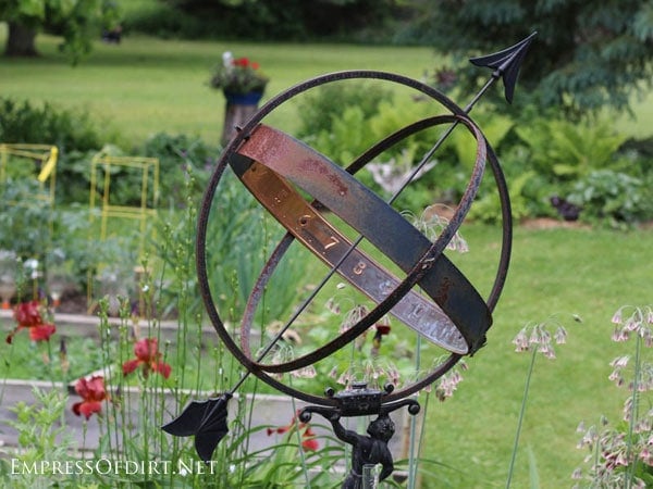 Rusty garden art orb. 